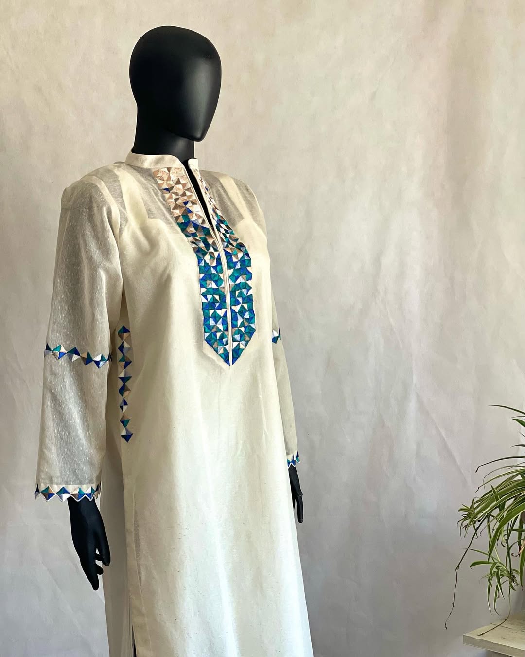 Off White Kurta with Embroidered Detailing